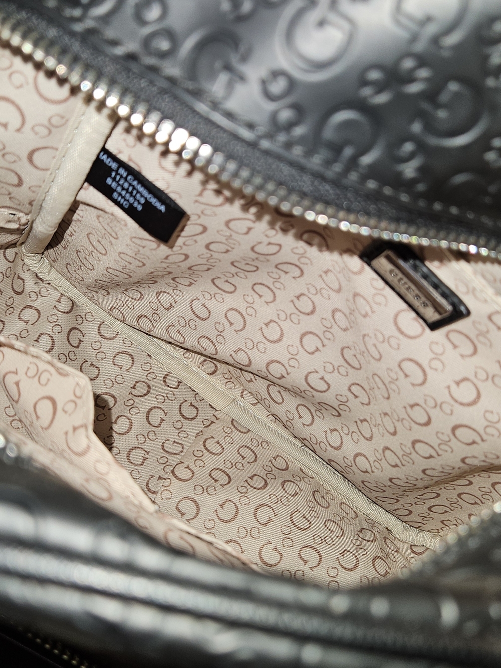 GUESS Black Embossed Logo Mini Backpack - Picture 2 of 3